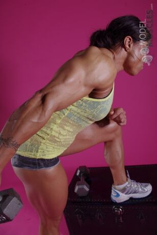 Splendid bodybuilder Karen Garrett flaunts her muscles while