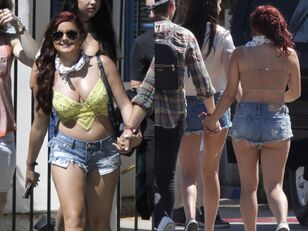 Ariel Winter demonstrates bosom in canary yellow cane top..